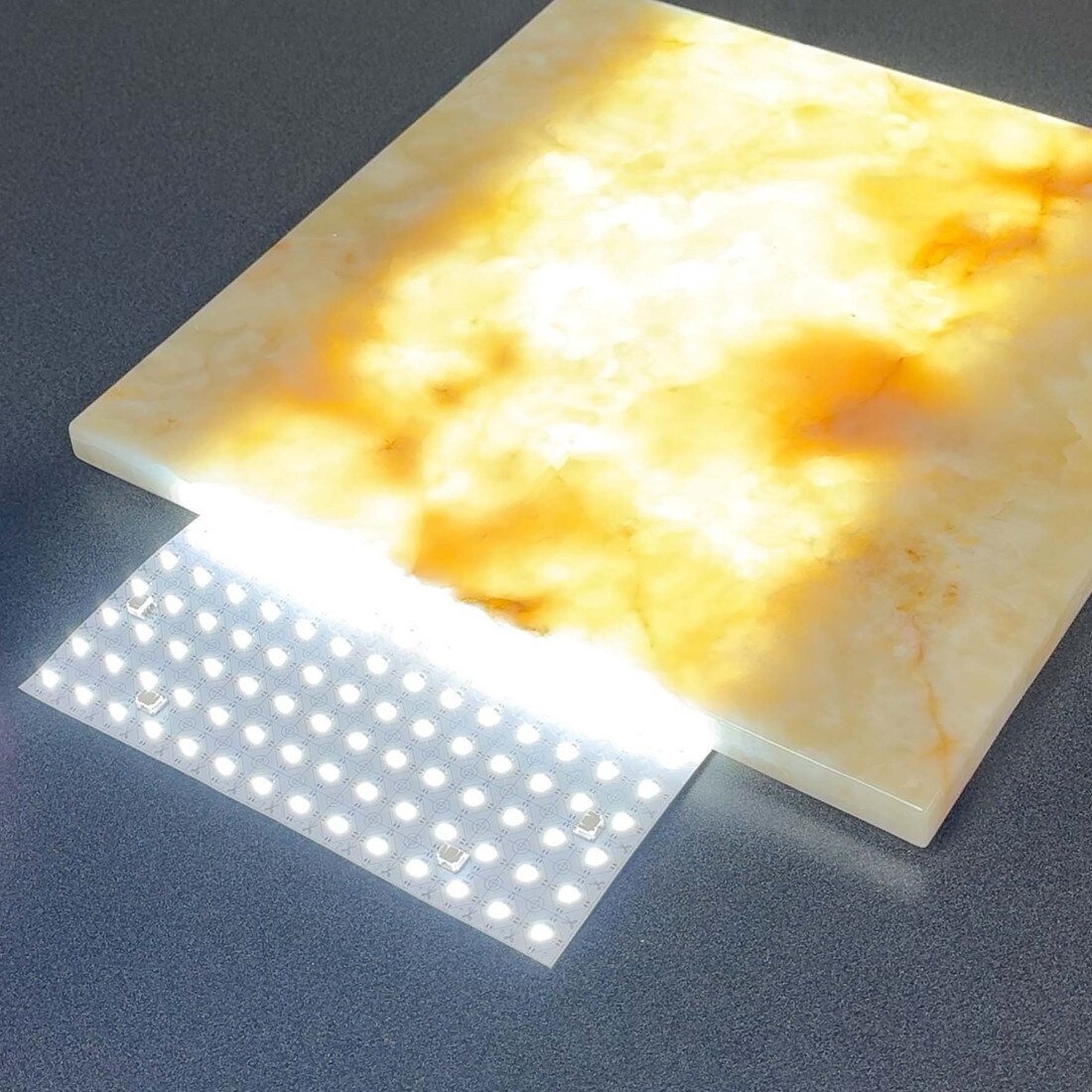 LED light sheet illuminating a translucent onyx slab with even backlighting